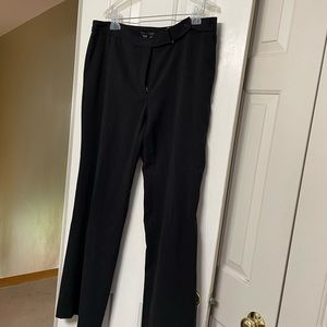 Women, black zipper ip front pants in size 14